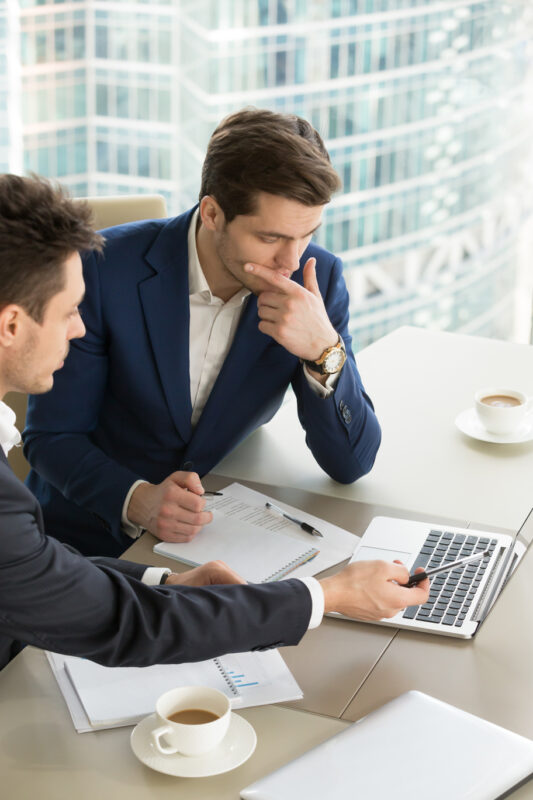 entrepreneurs discussing work results meeting